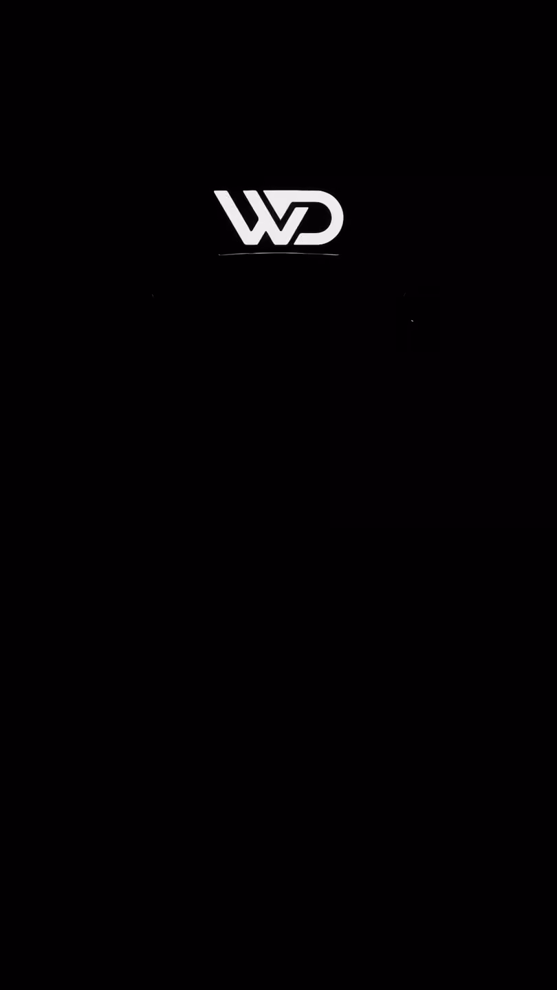 The glowing WD sign in a dark bay; a light tunnel powers on arch by arch around a green Lamborghini Urus
